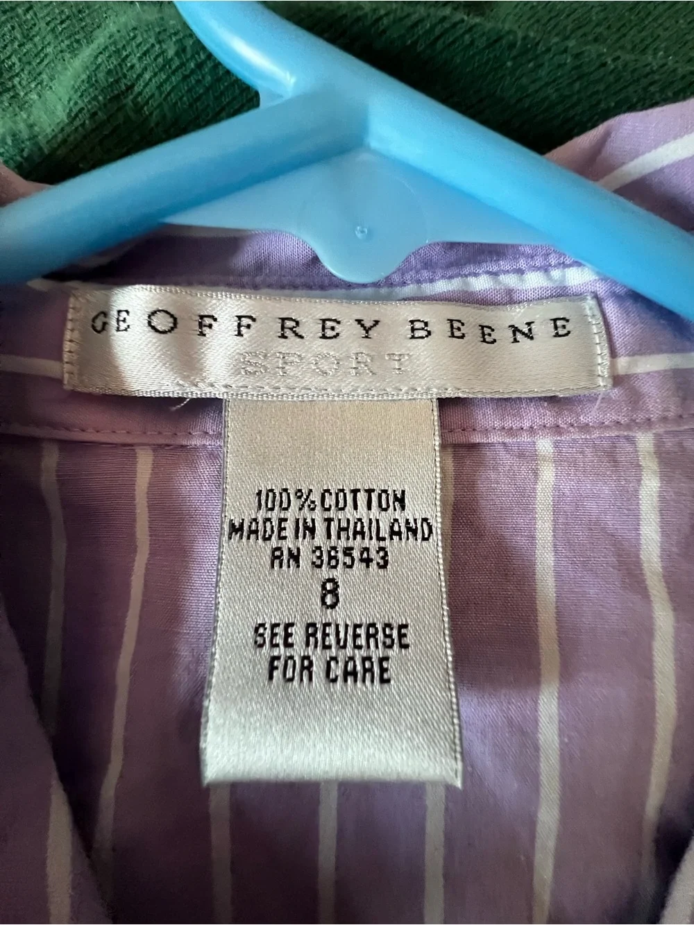 Geoffrey Beene sleeveless button